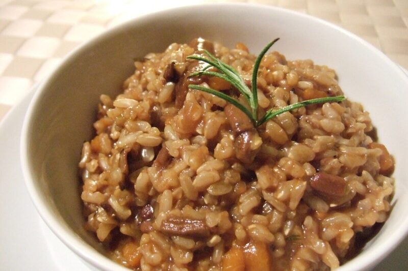 Creamy mushroom risotto garnished with parsley and Parmesan