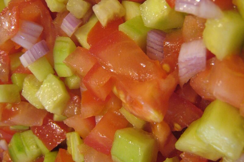 Bowl of Persian Shirazi salad, finely diced cucumber, tomato, and onion